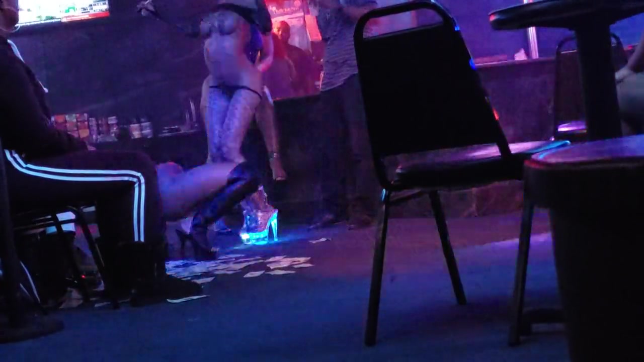 Strippers giving lap dances